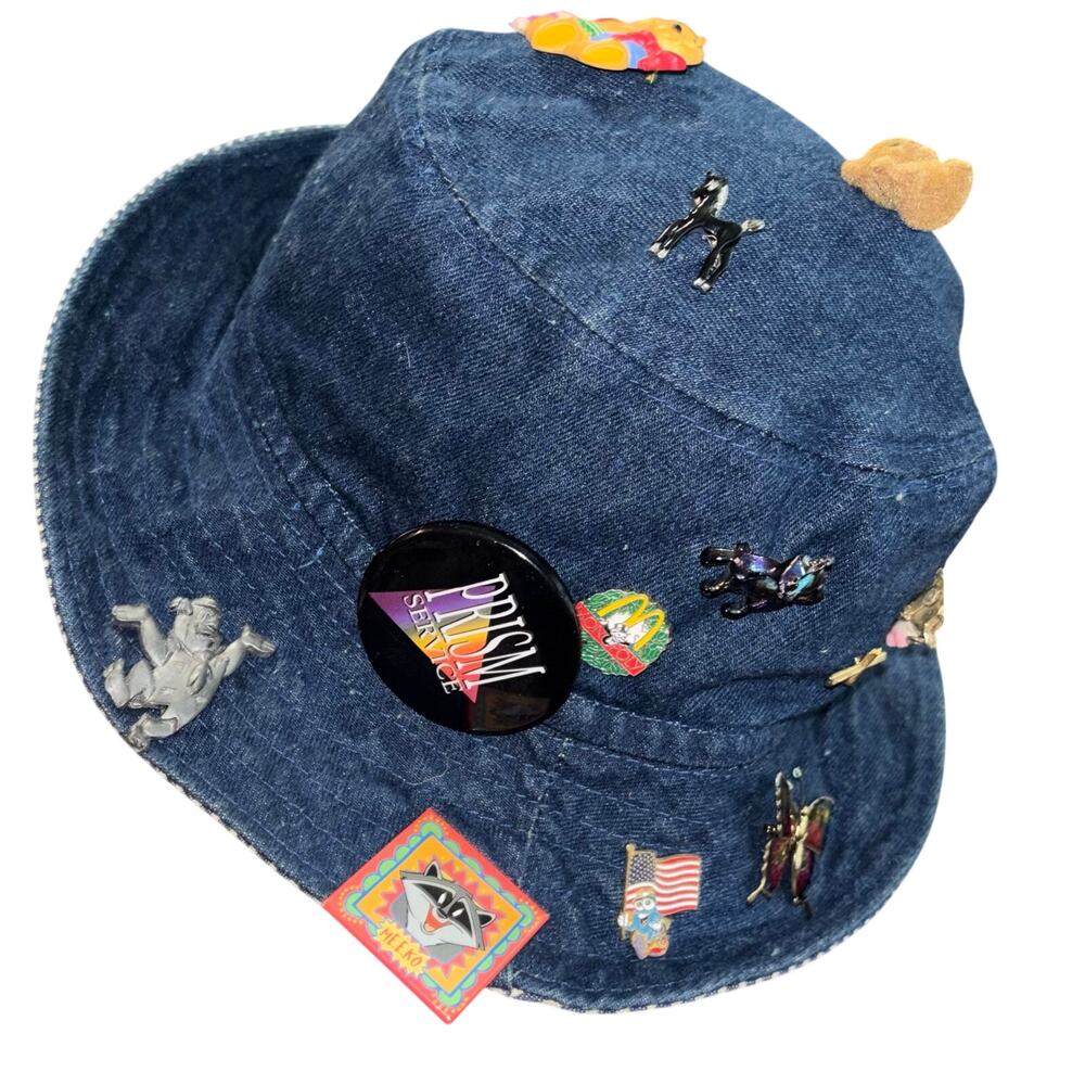 Vintage denim bucket hat with random pins and buttons Disney Olympics religious